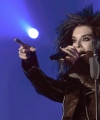 61865_Celebutopia-Bill_Kaulitz_performs_on_stage_during_concert_in_Rome-01_122_1068lo.jpg